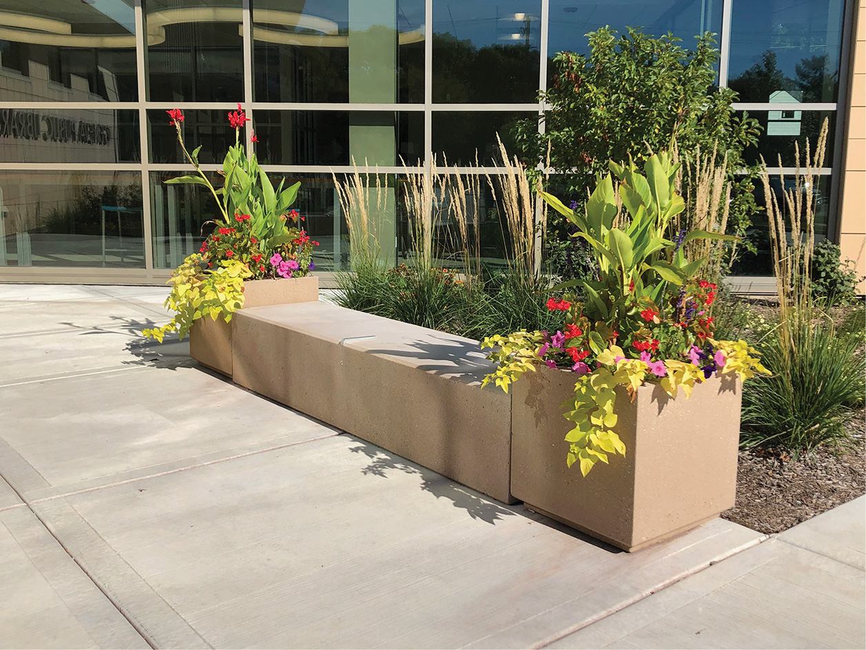 Doty & Sons concrete planters in front of building