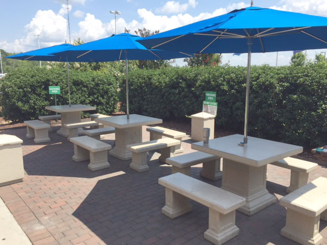Concrete tables for employee break area patio.